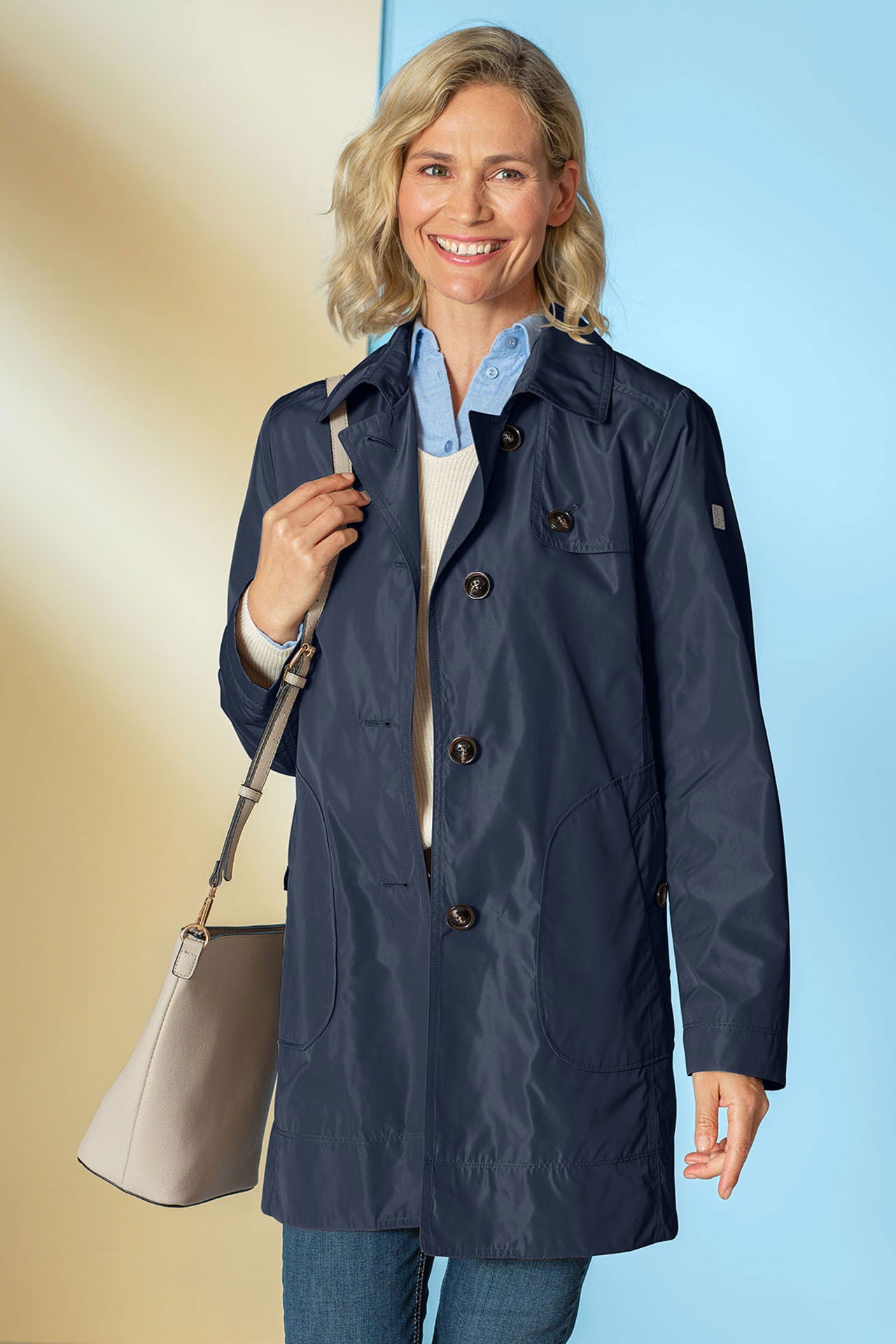 Detalj av 3-i-1 trenchjakke for dame - Betty Barclay