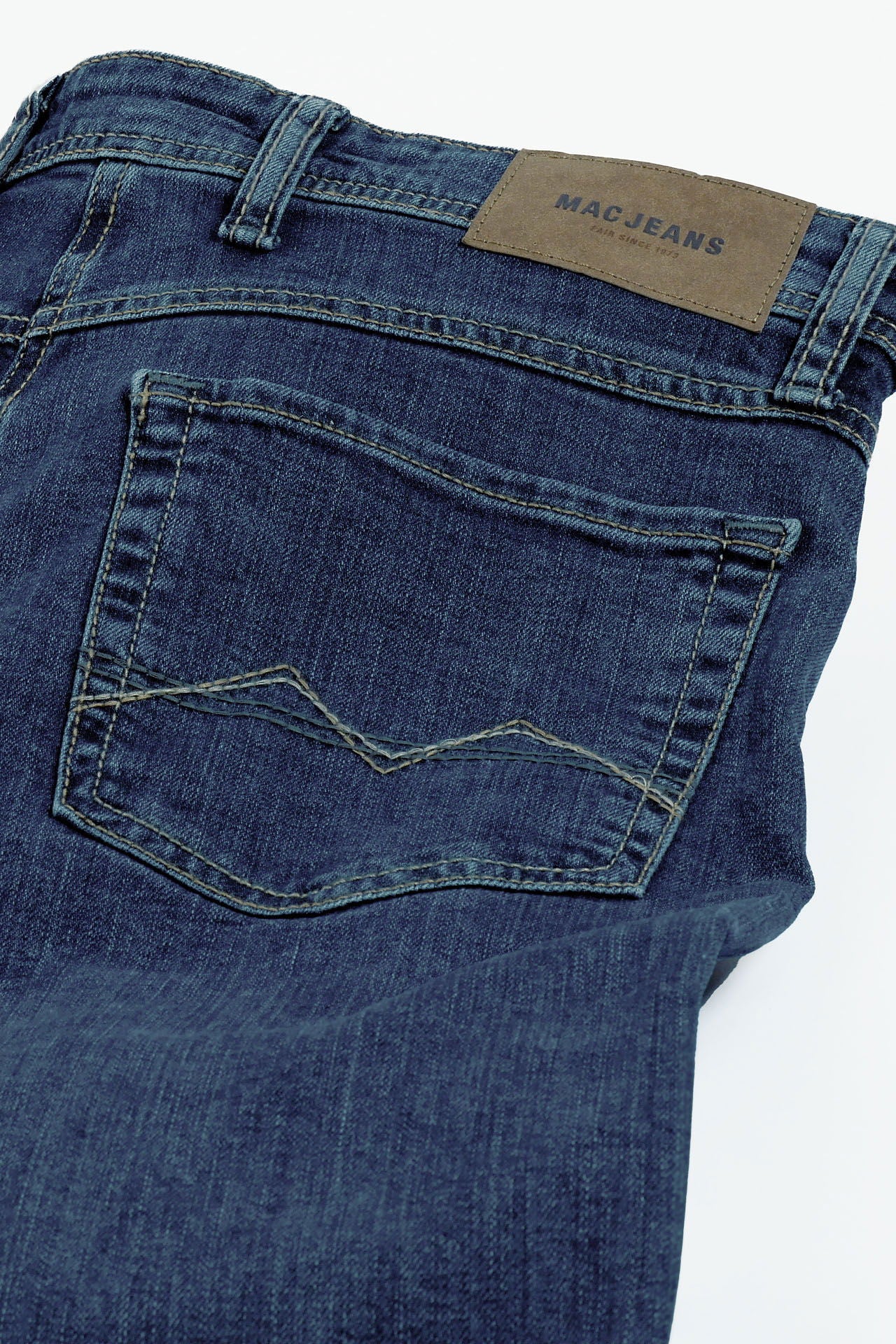 5-pocket jeans resirkulert bomull used-vask nærbilde stoff
