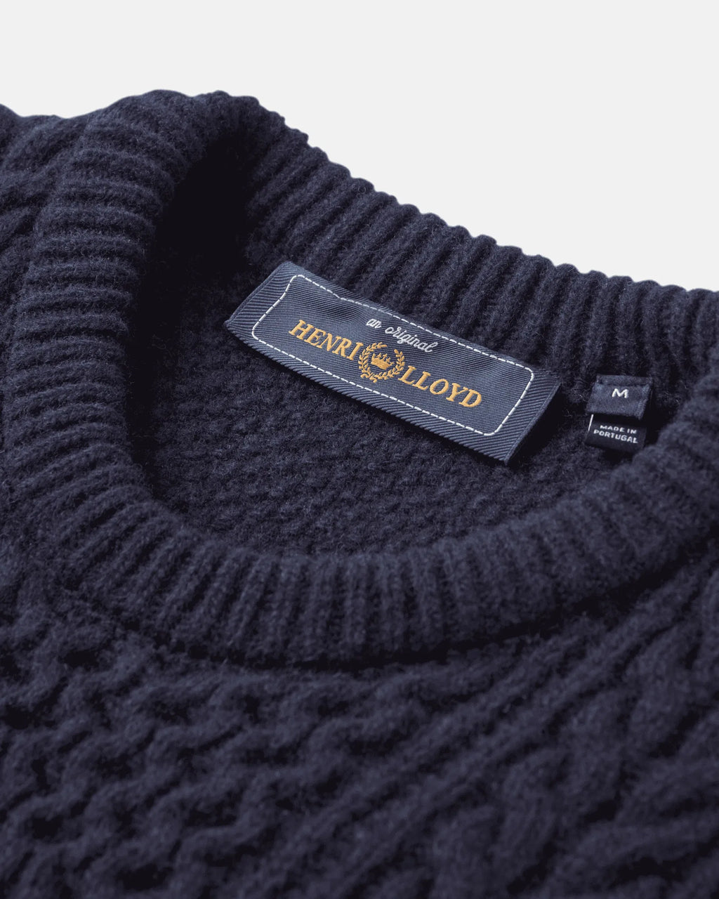 Erme og mansjett på Abersoch Cable Knit genser 80 % ull flettestrikk