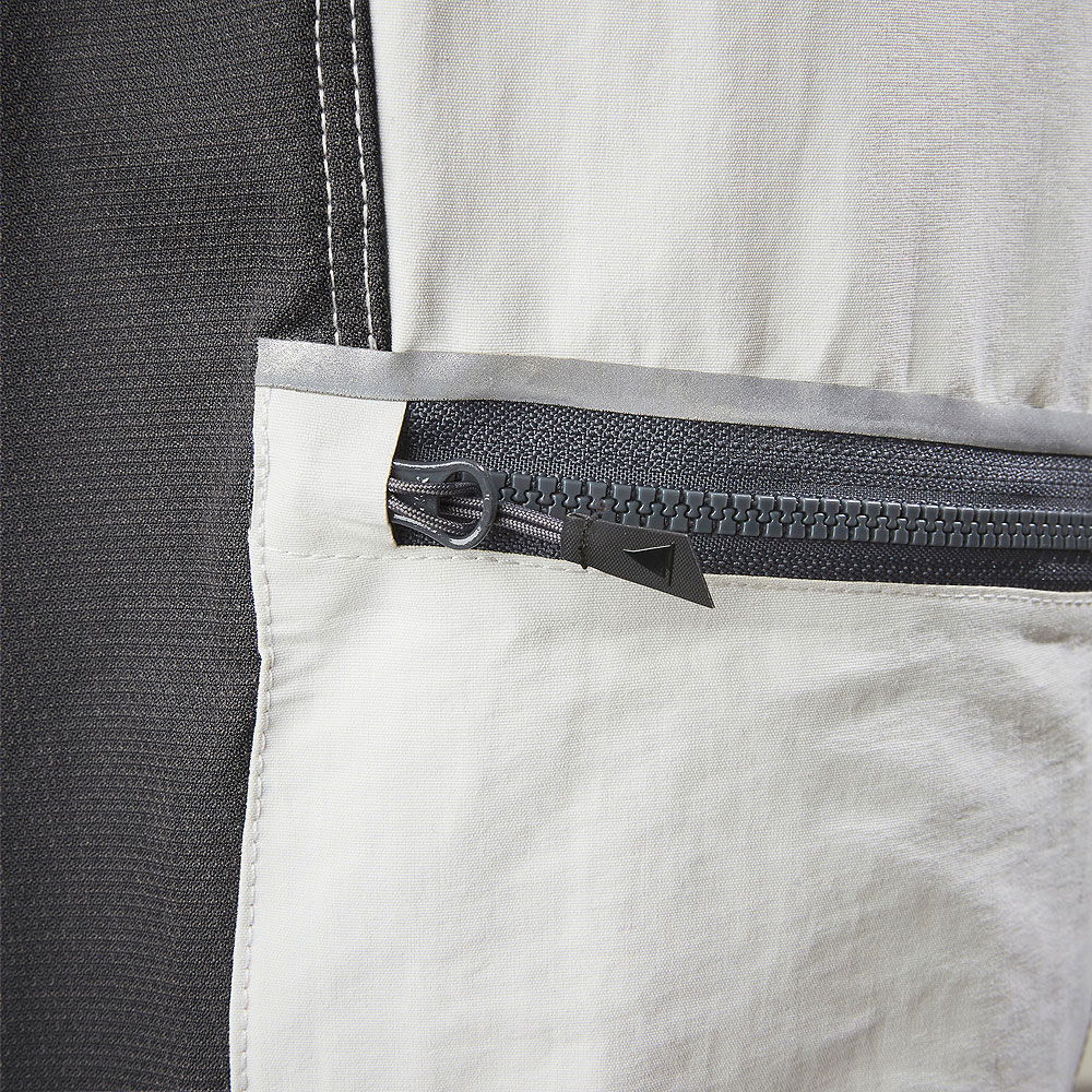 Nærbilde av stretch-materiale på Evolution Performance 2.0 seilerbukse long UPF 40 - Musto