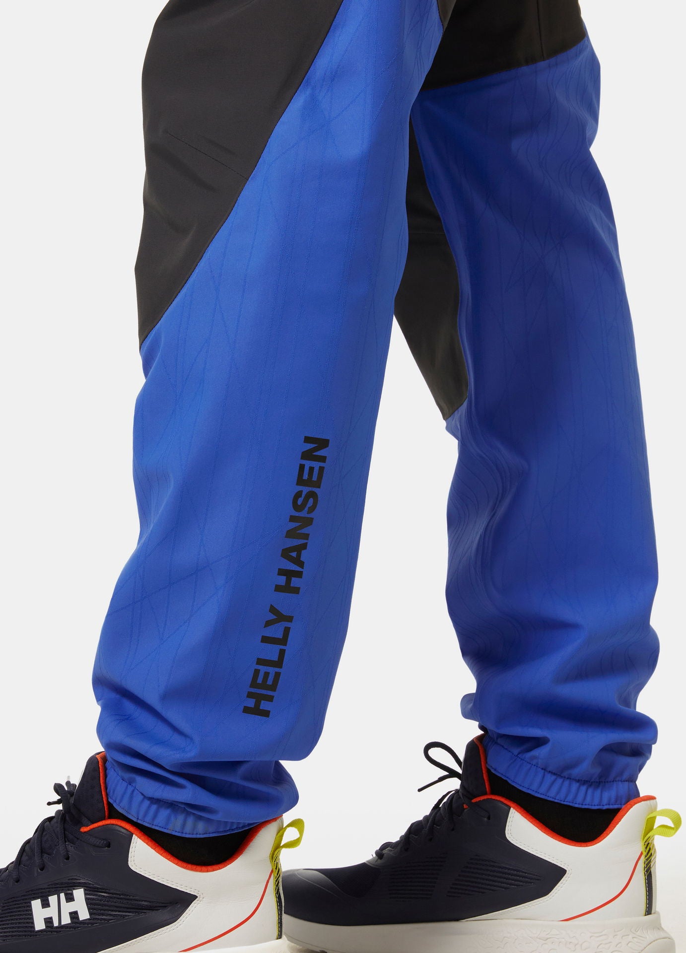 Nærbilde av glidelås på Foil X Racing salopette HELLY TECH Professional