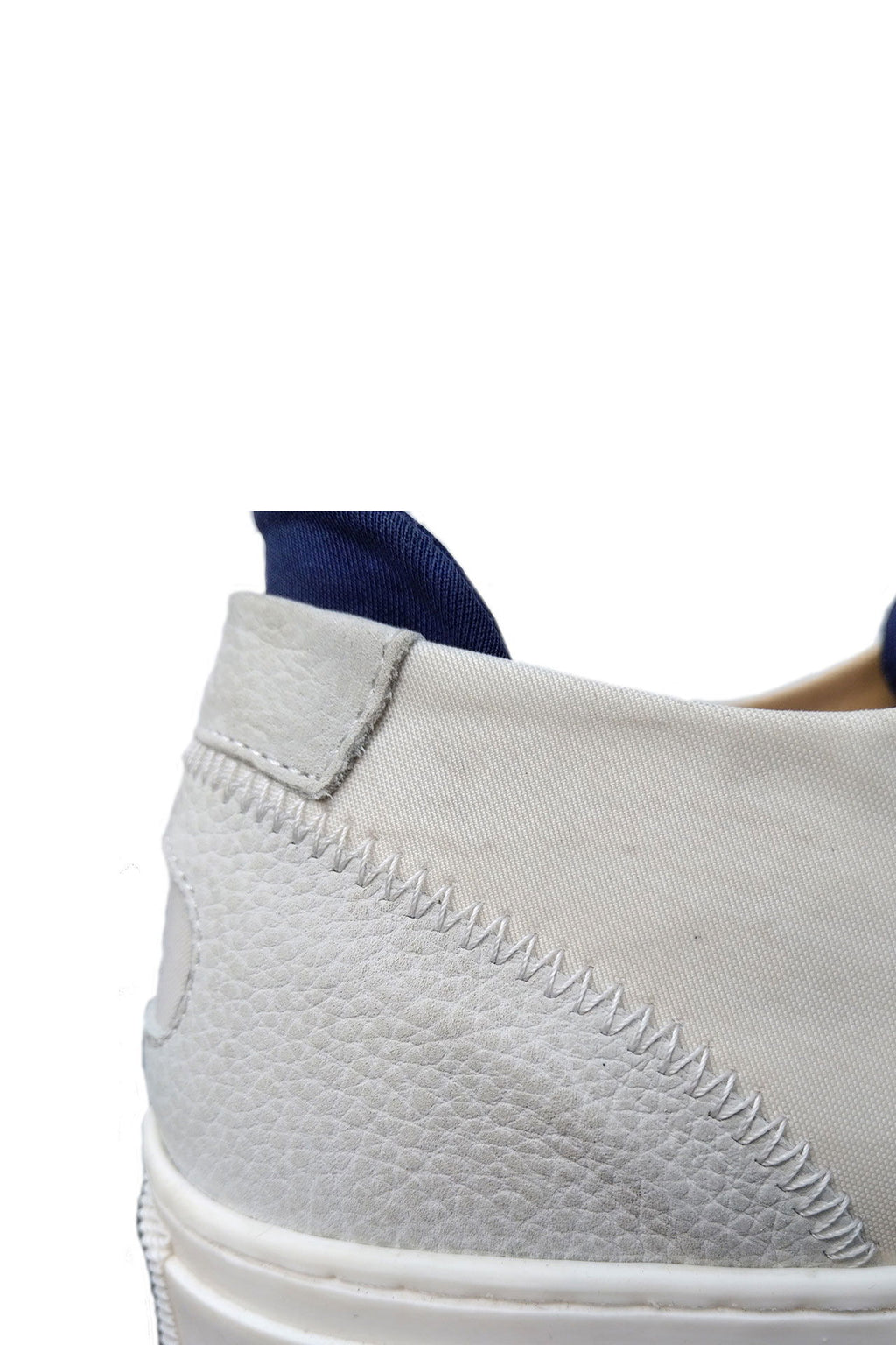 Jib sneaker i resirkulert seilduk med lærdetaljer nærbilde av såle