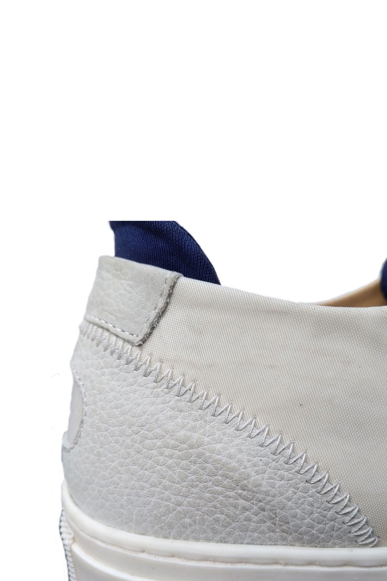 Jib sneaker i resirkulert seilduk med lærdetaljer nærbilde av såle