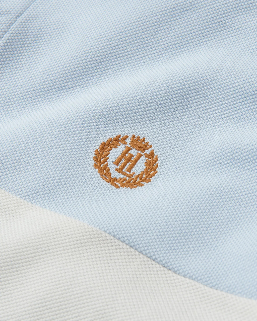 Nautique poloskjorte økologisk bomull 190 g piqué detalj av logo