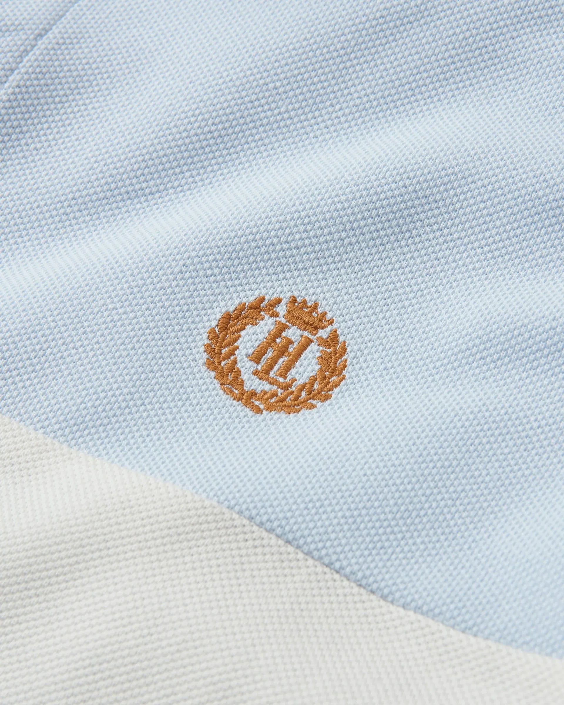 Nautique poloskjorte økologisk bomull 190 g piqué detalj av logo